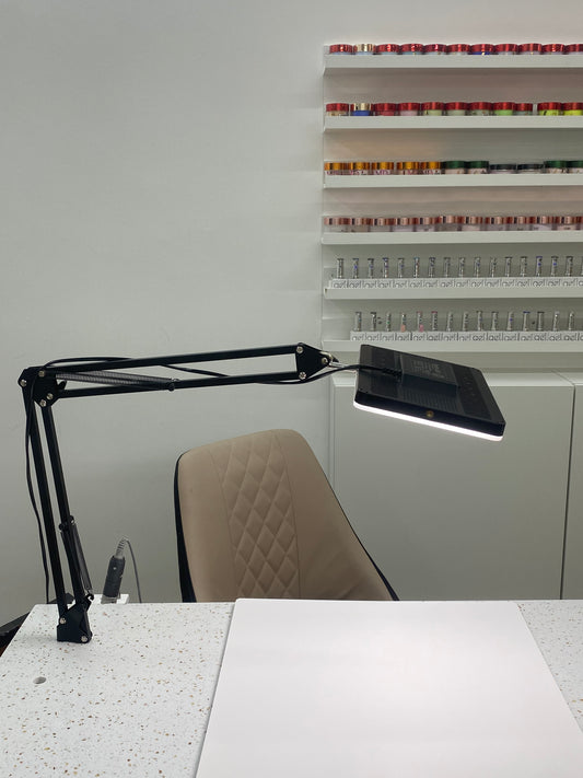 Photo light panel with arm
